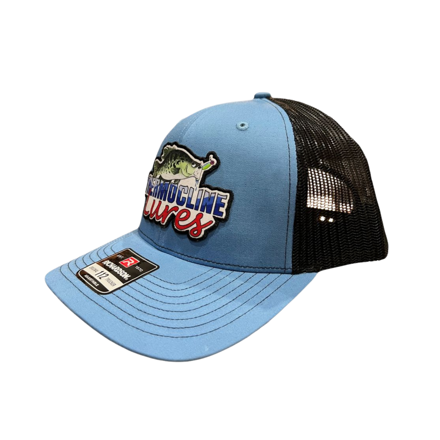Left side view of the Thermocline Lures Columbia Blue and Black Richardson 112 Trucker Hat, featuring a bold color pairing and signature Thermocline patch.